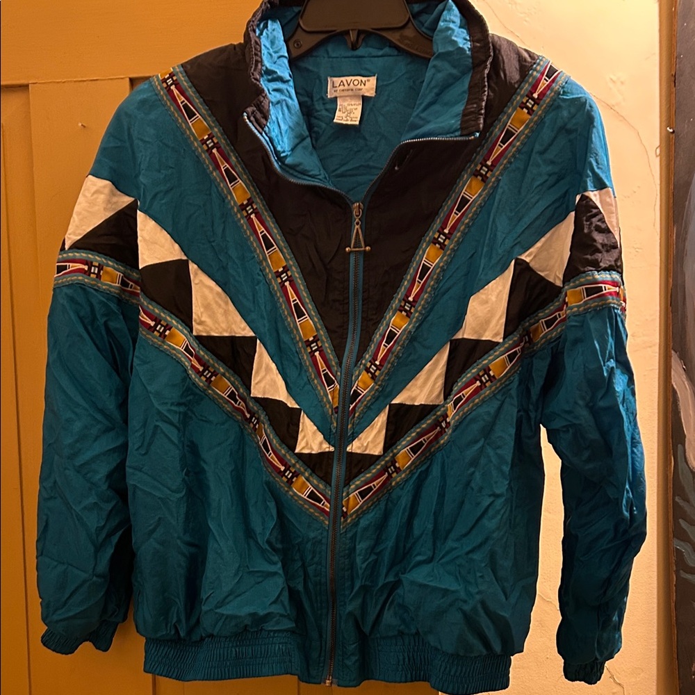3/$20 Women’s tribal print Vibrant Blue and Black Windbreaker